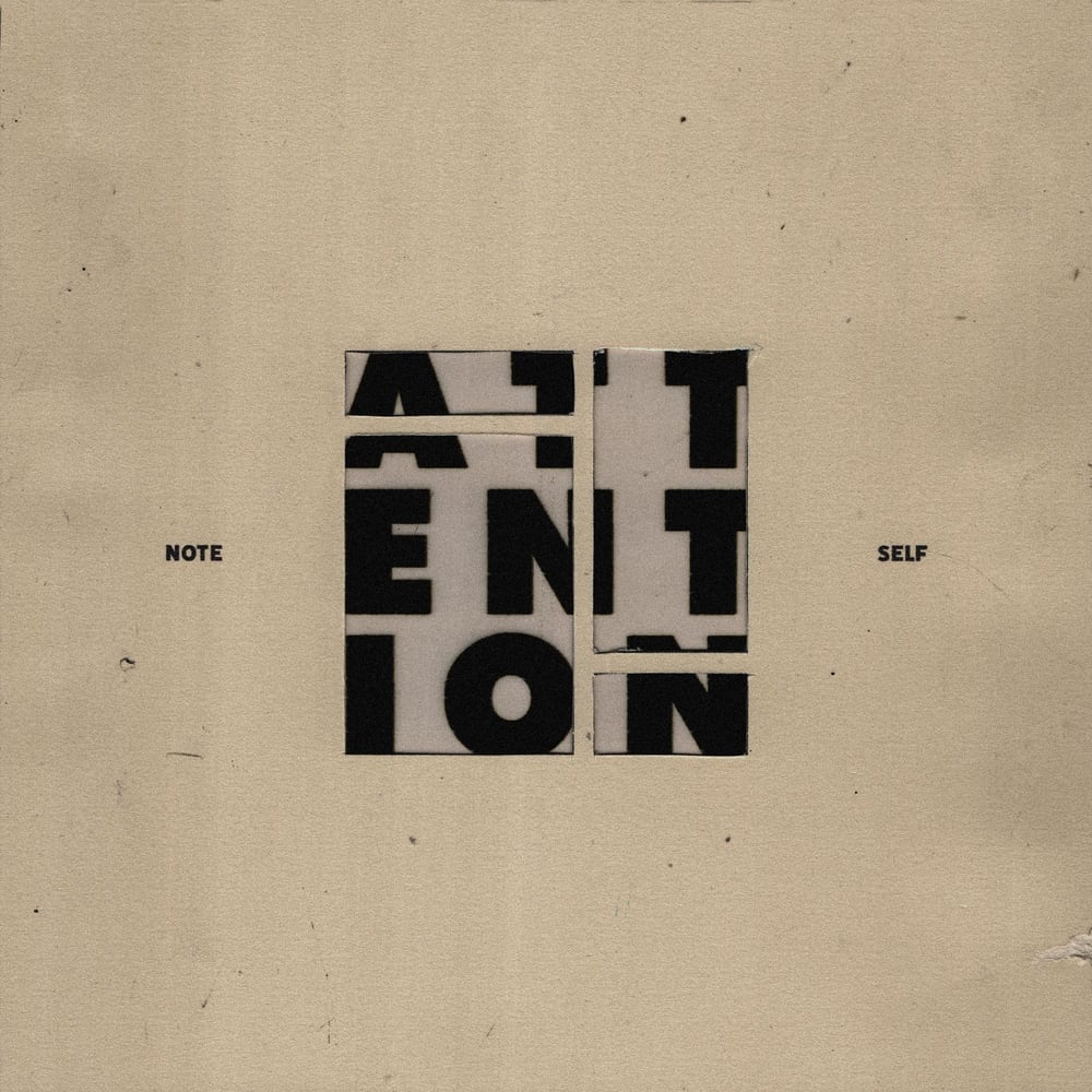Attention cover art: the word ATTENTION cut from paper in black capitals and collaged on kraft board, NOTE and SELF printed either side